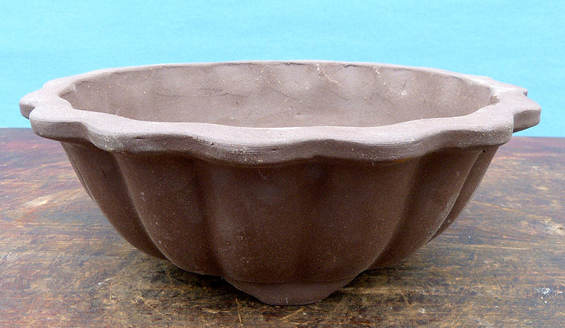 Bonsai Basics - Round Unglazed Bonsai Pot - 7" - Being hand made basic quality some finish, colour and size variations, minor distortions and marks can occur.
